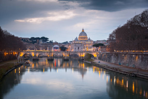 Saint Peter Basilica in Vatican city with Saint Angelo Bridge in Rome, Italy