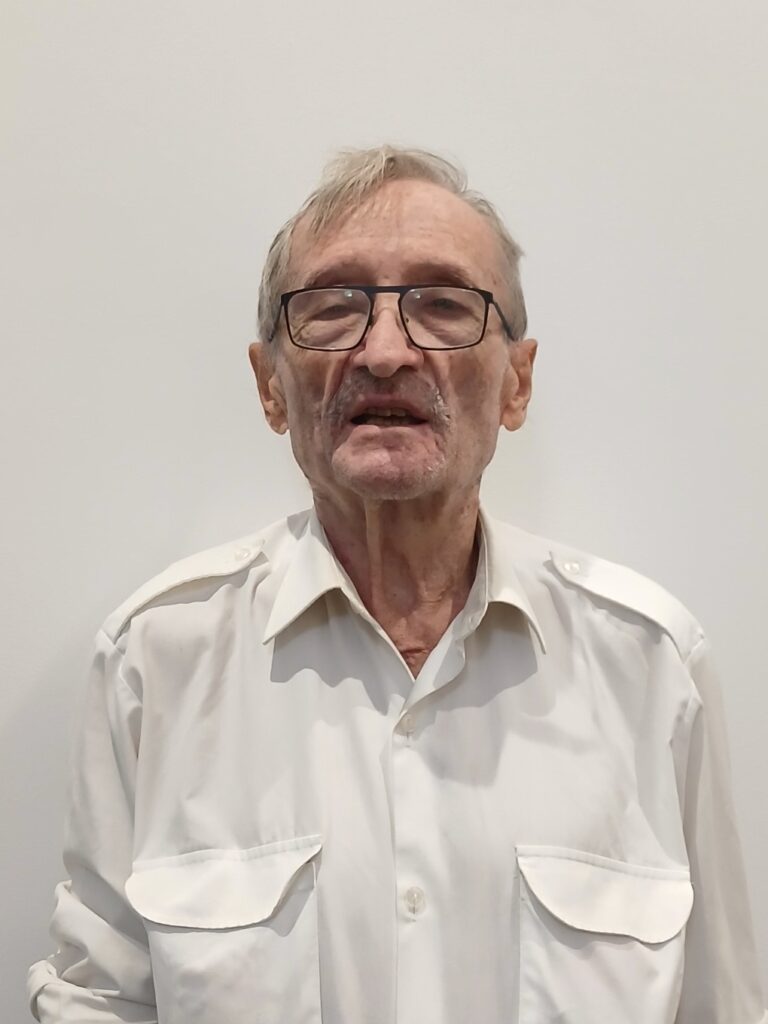 Dr. Hugues Scharbach